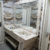 "beautiful-bathroom-counter-with-carrara-marble"